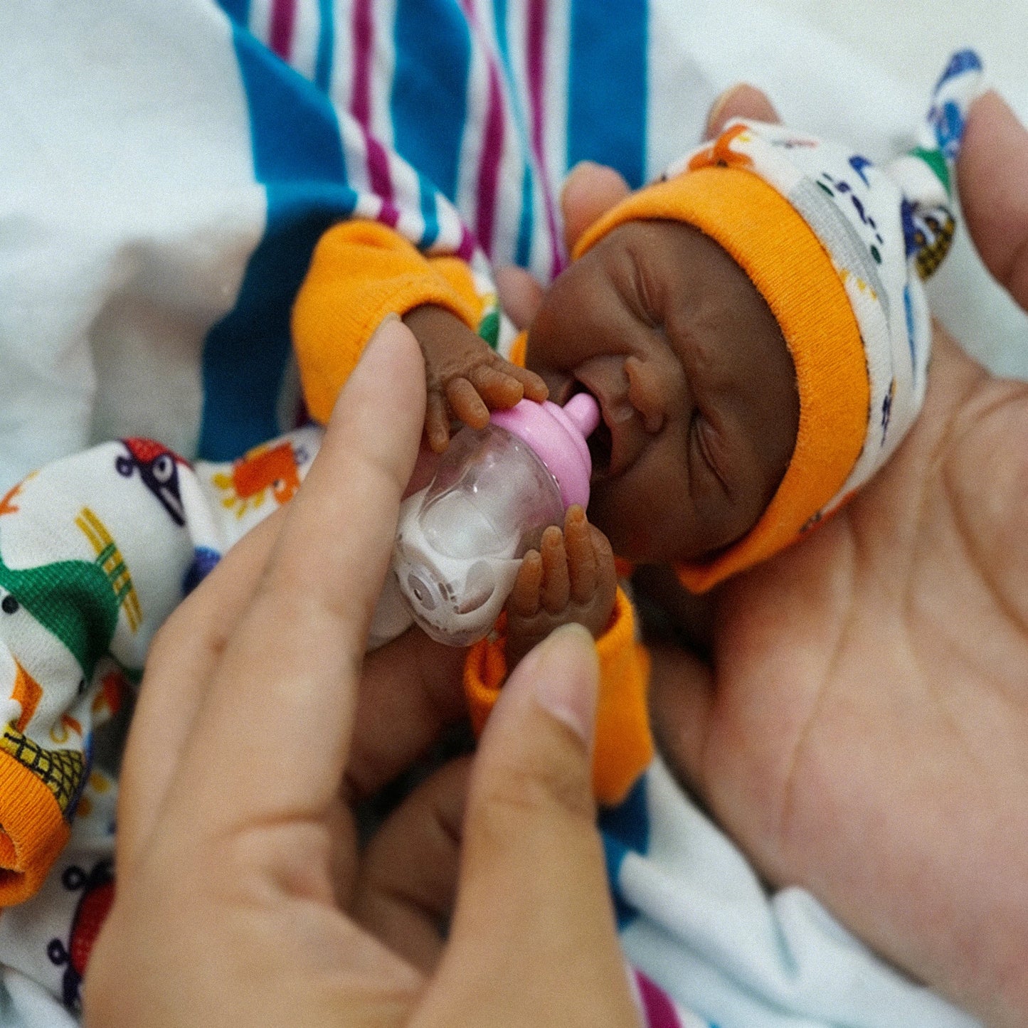 7-Inch Mini Sleeping Boy African Silicone Baby Doll Lifelike Soft Realistic with Feeding Accessories Collectible Doll